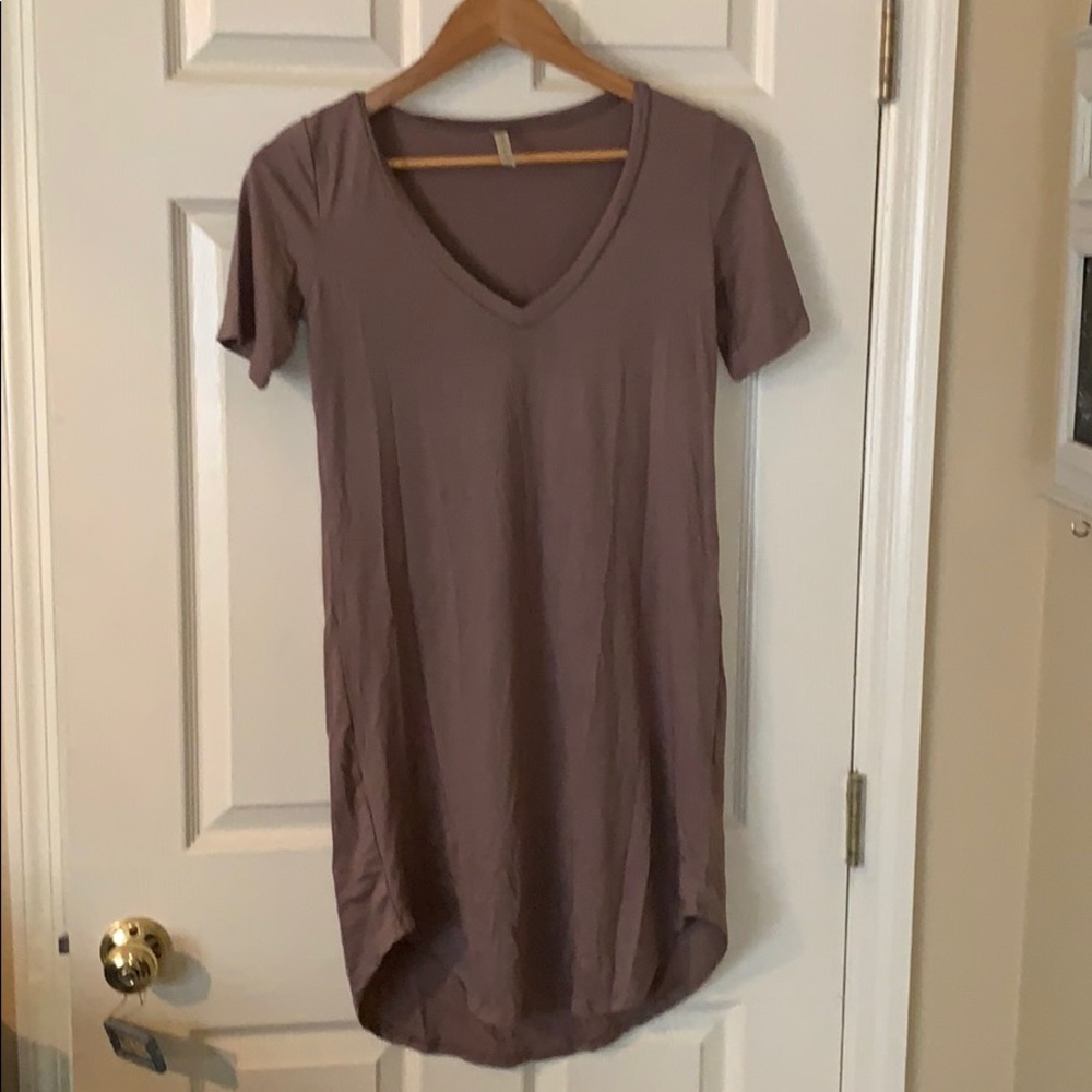 New dress, never worn. Cover up.